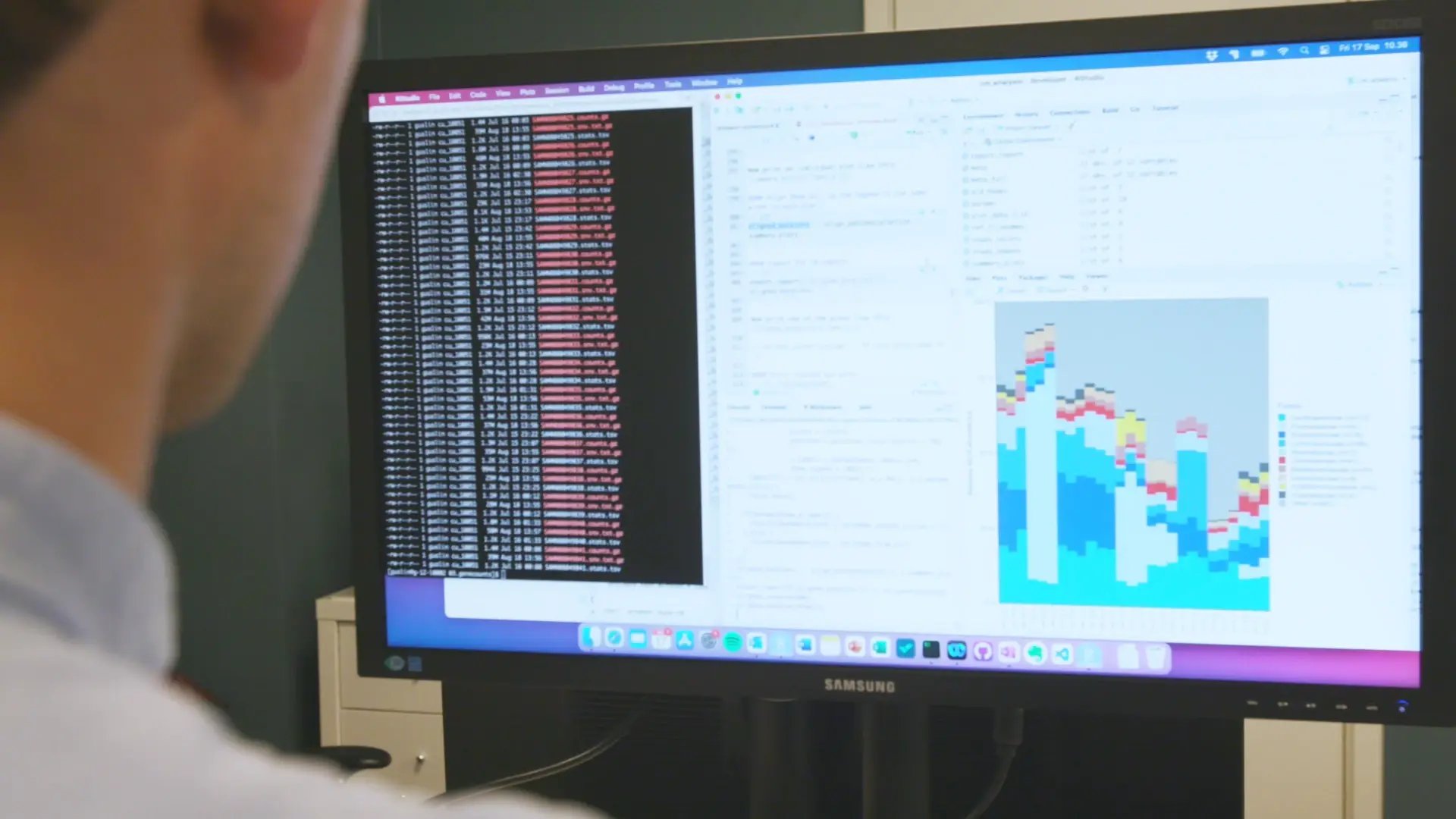 scientist looking at data on a computer