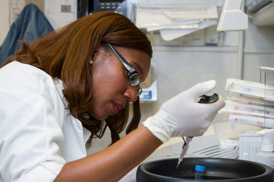 A scientist testing probes in a laboratory